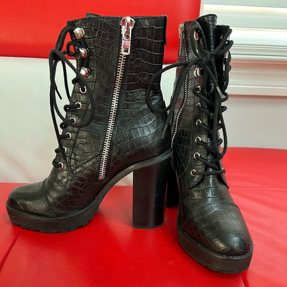 Black leather high heels boots